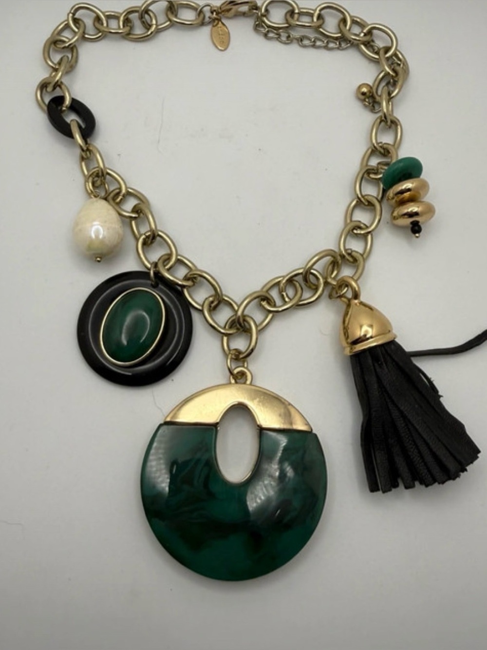Chico’s Gold Tone Necklace with Green Resin Pendant and Black Tassel